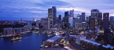 Skyline of financial district in Sydney at end of day.